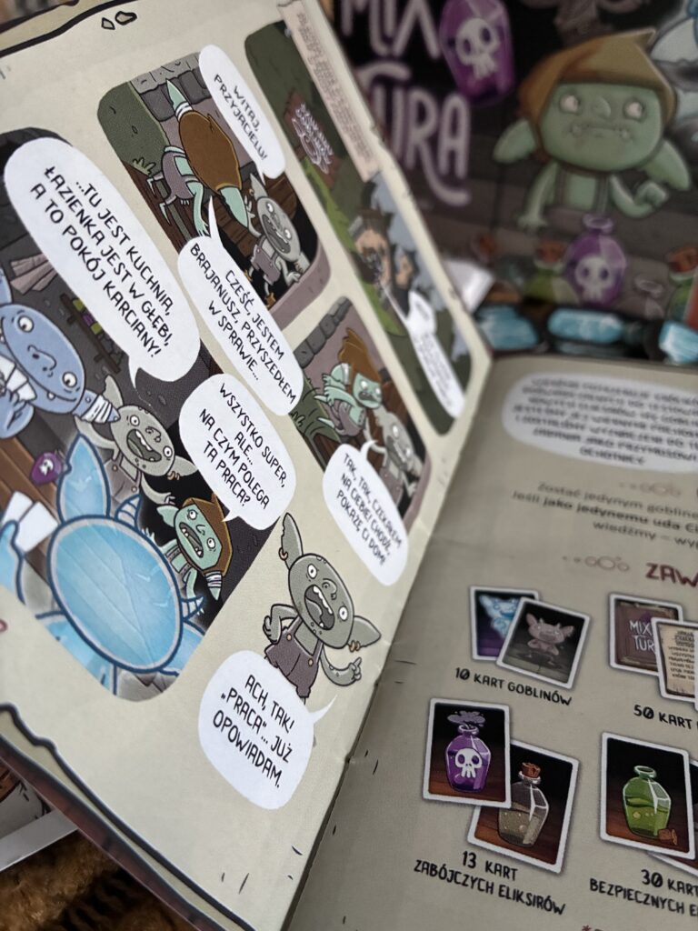 Instrukcja gry mix tura, w tle jest jej opakowanie